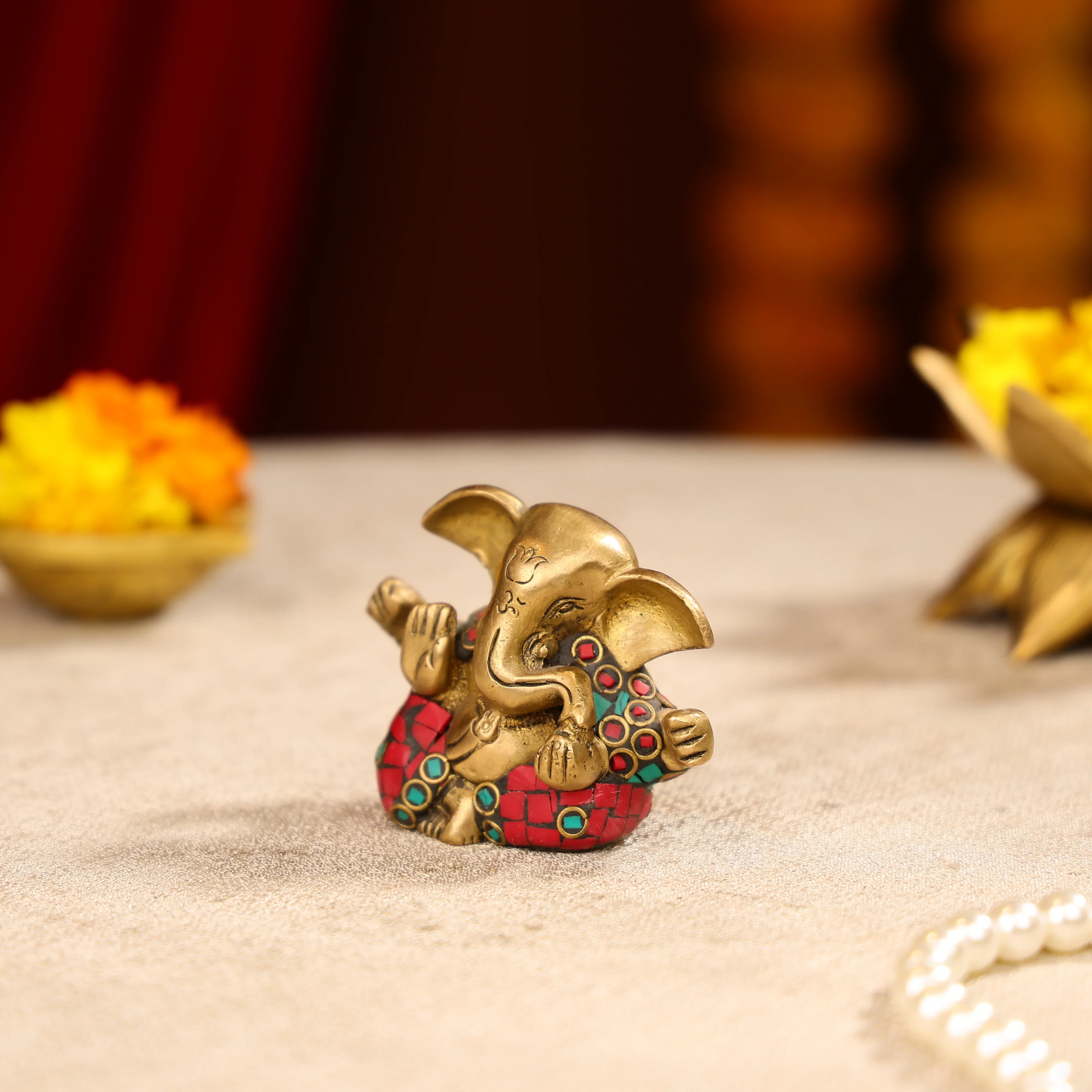 Brass Lord Ganesha Idol With Colourful Traditional Attire - Image 3