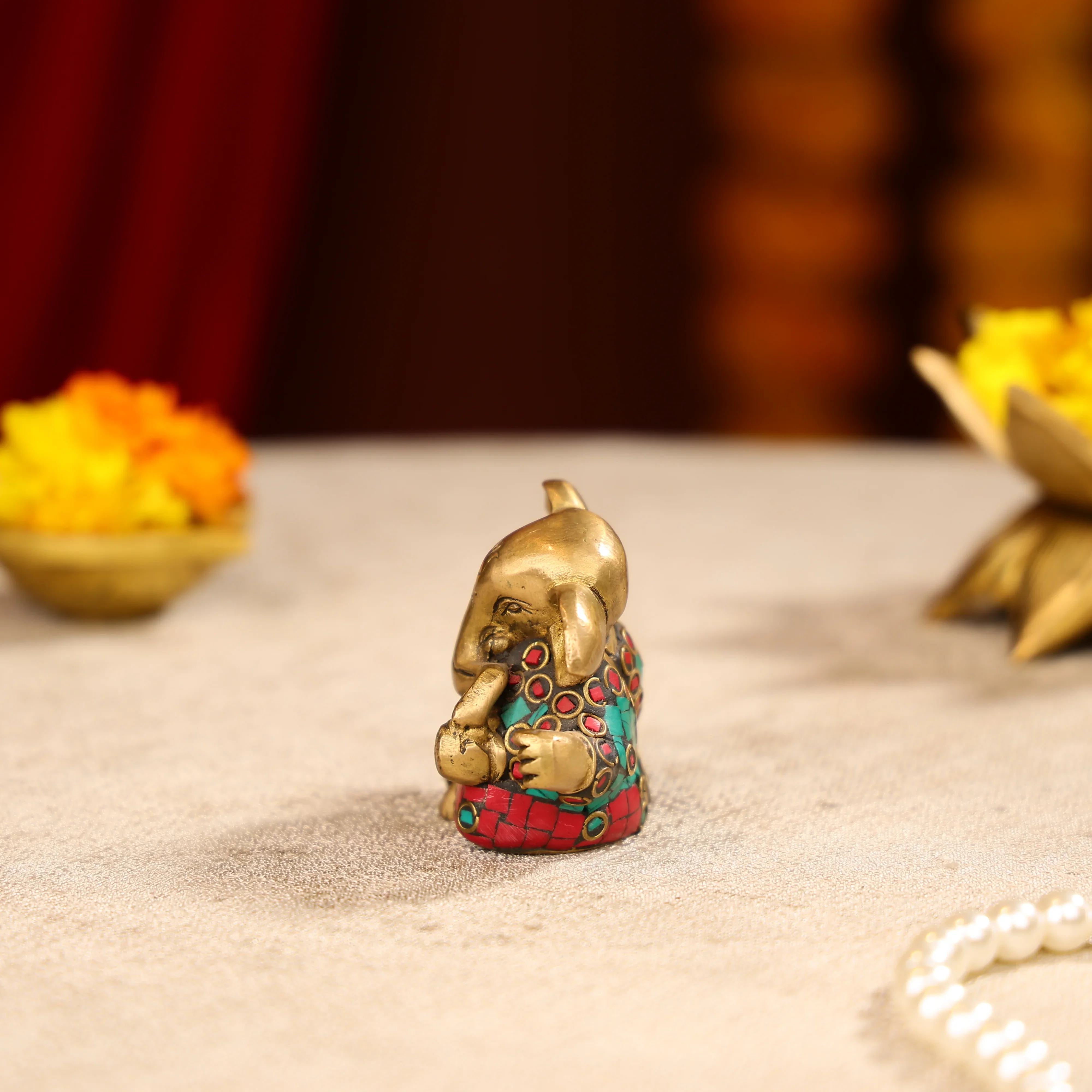 Brass Lord Ganesha Idol With Colourful Traditional Attire - Image 4