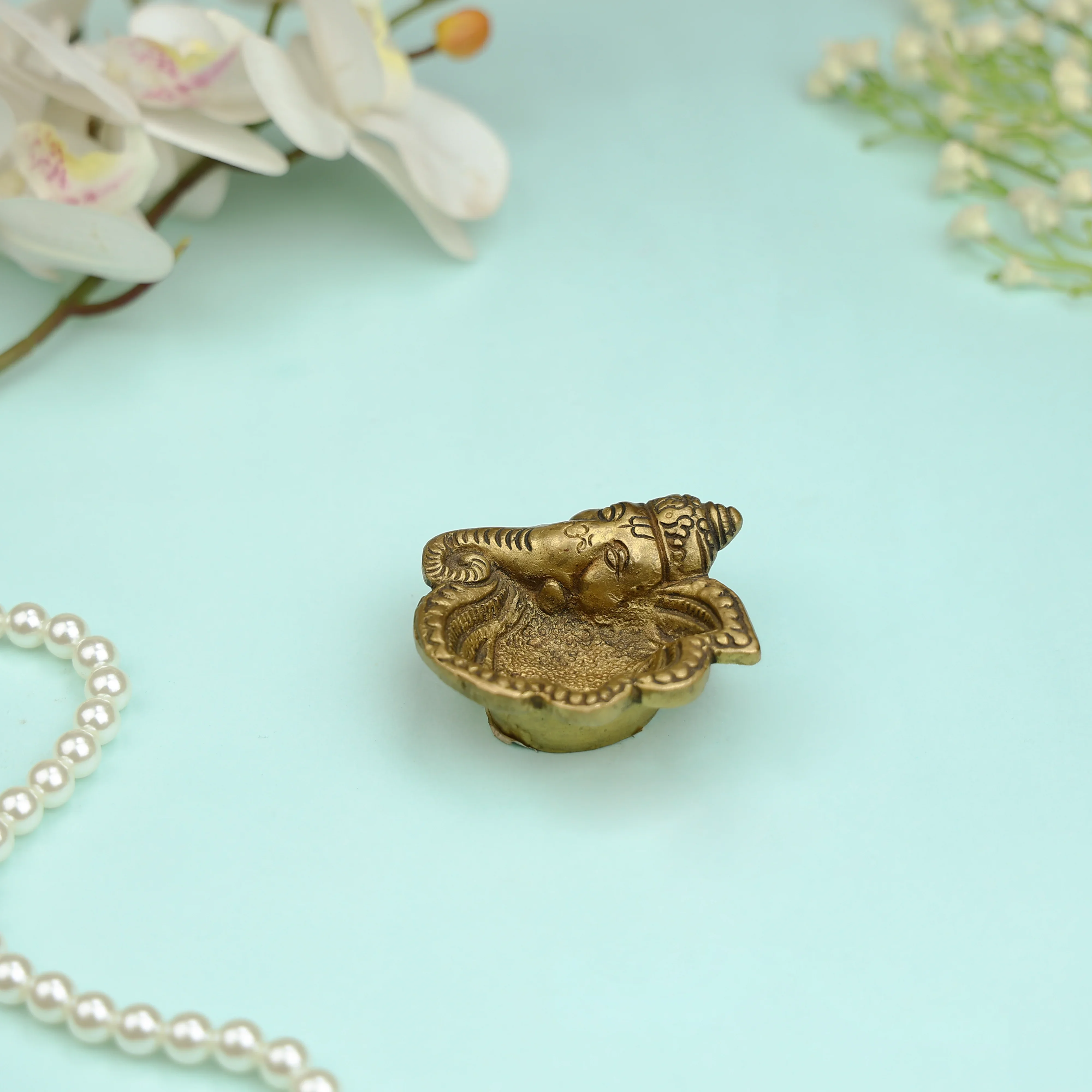 Brass Lord Ganesha Shankh Shaped Diya - Image 2